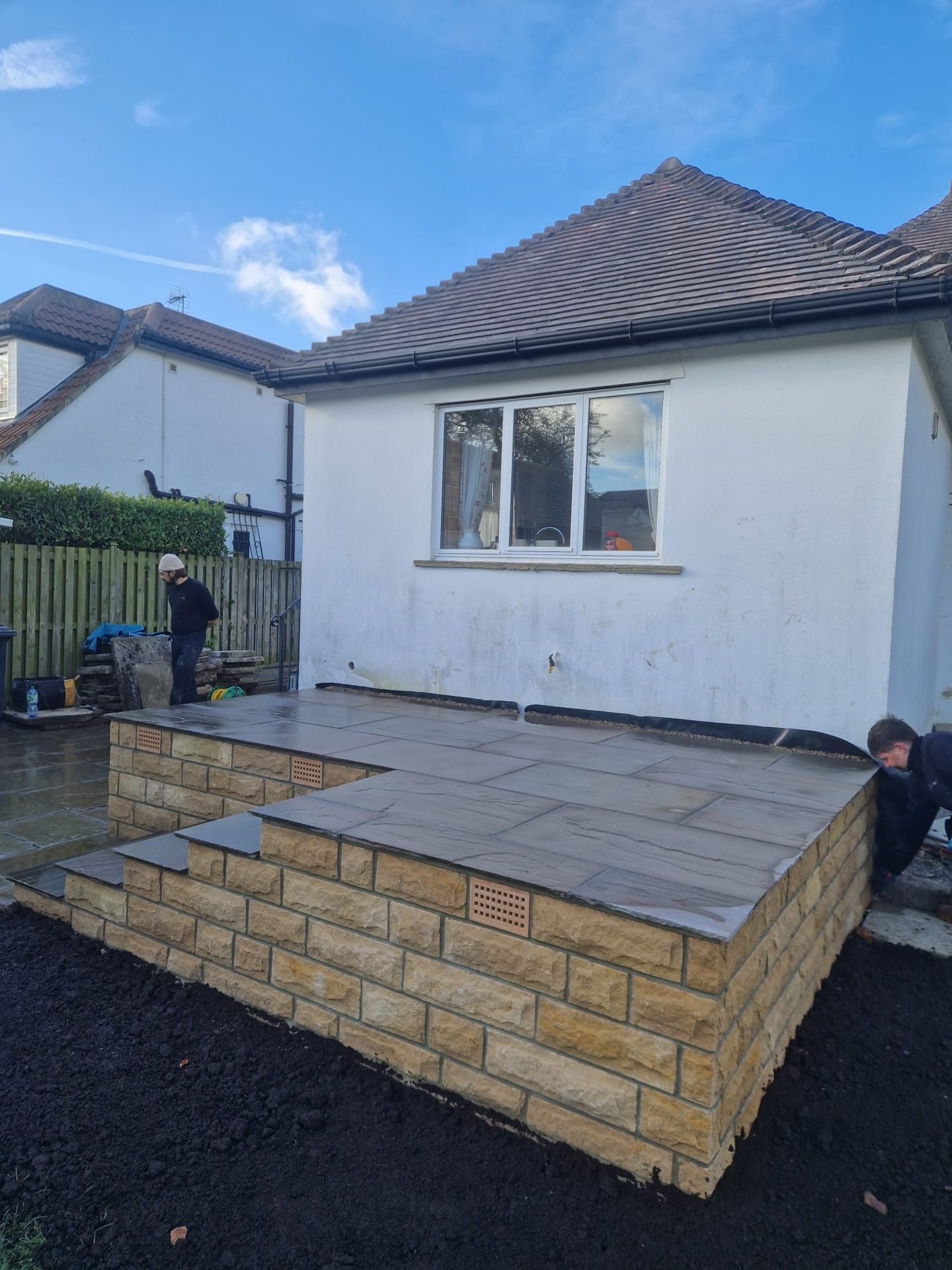 Raj Blend Indian stone with 140mm coursed Yorkshire stone walls in Bramhope